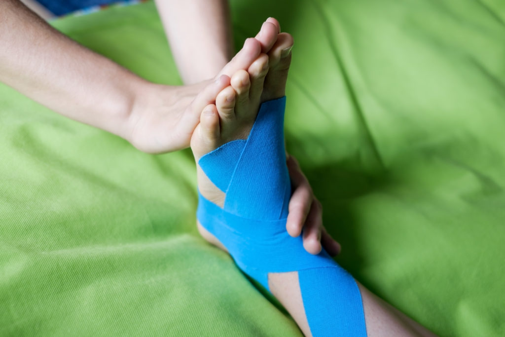 Benefits of Kinesiology Tape | Universal Wellness Source